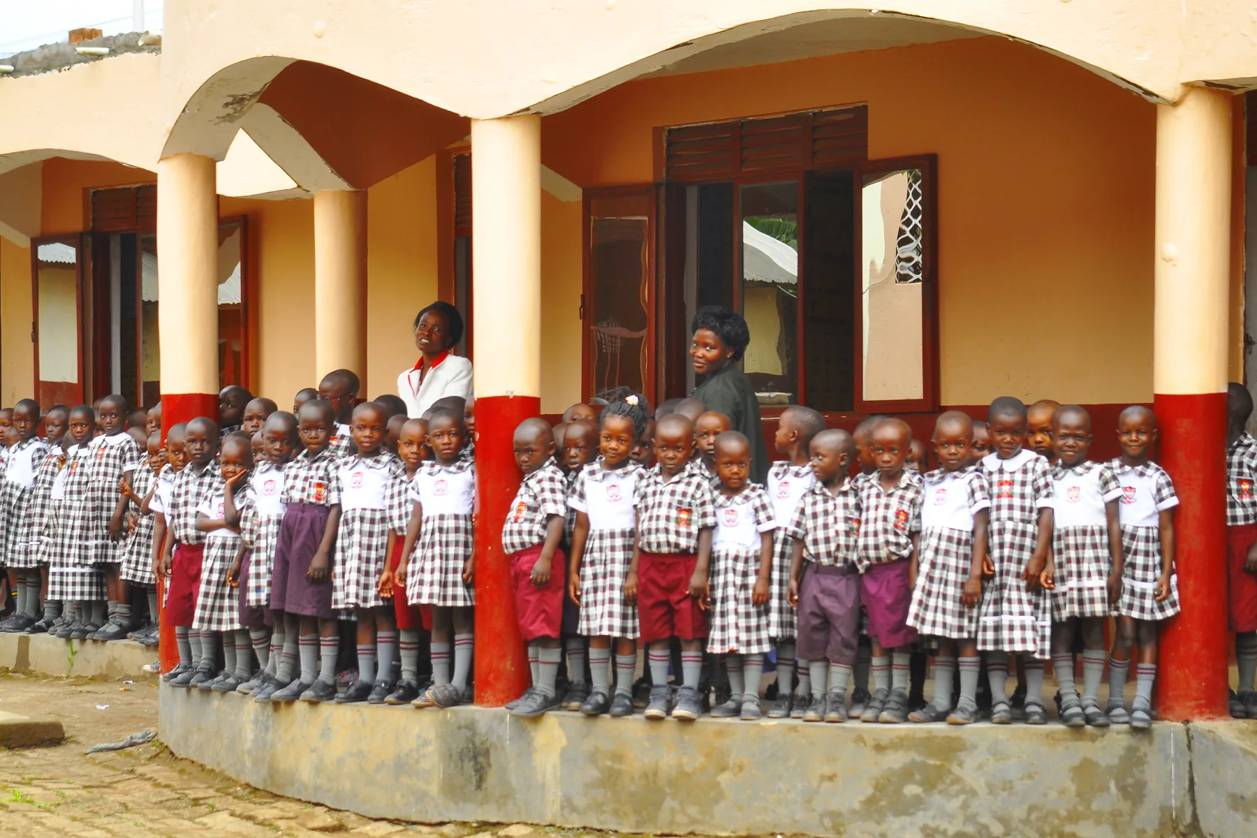 Nursery pupils standing together on the verandah